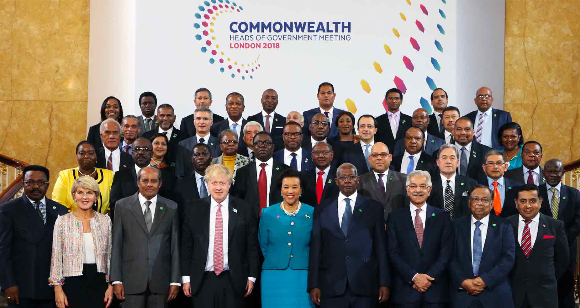 The Commonwealth Secretariat senior staff standing with Boris Johnson