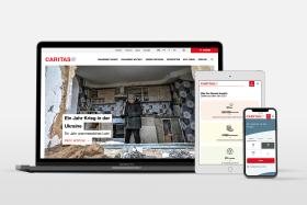 The homepage of Caritas Schweiz shown on laptop, tablet and mobil devices