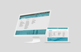 Natus website on computer and laptop monitor