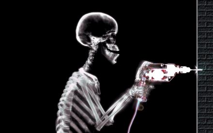 Xray skeleton with a power drill.