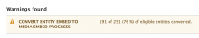 When it hasn't finished converting, the module adds a warning to the status screen with a summary of its progress.