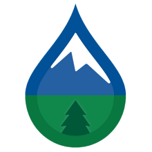 Drop icon with a mountain and tree embedded